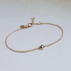 "Celestial" bracelet i gold with a grey diamond