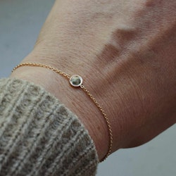 "Celestial" bracelet i gold with a grey diamond