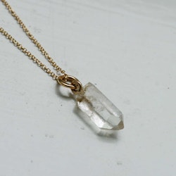 "Swedish Ice" Pendant in gold with a raw Swedish rock crystal