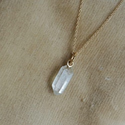 "Swedish Ice" Pendant in gold with a raw Swedish rock crystal