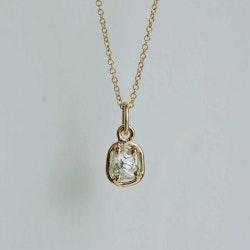 "Raw" pendant with a raw diamond