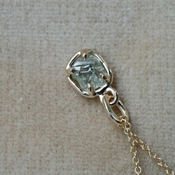 "Raw" pendant with a raw diamond
