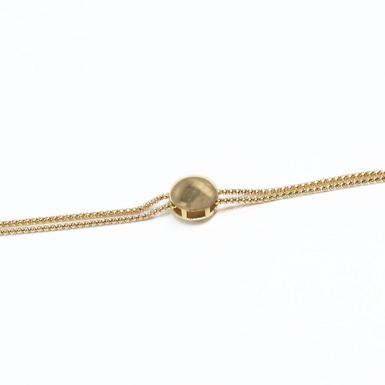 Dubbel kedjor armband i 18k gult guld