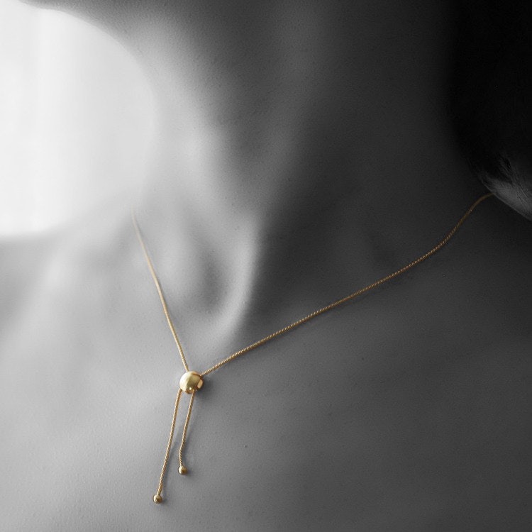 halsband, hängen med lång oc halskedjor i18 karat