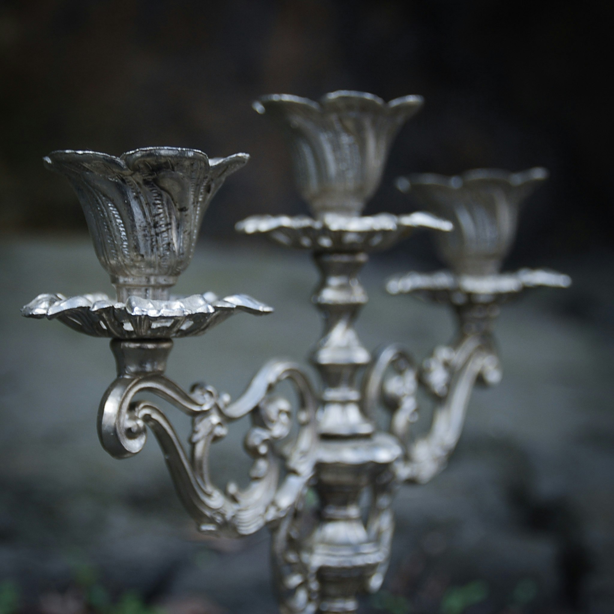 Three-armed candlestick silver