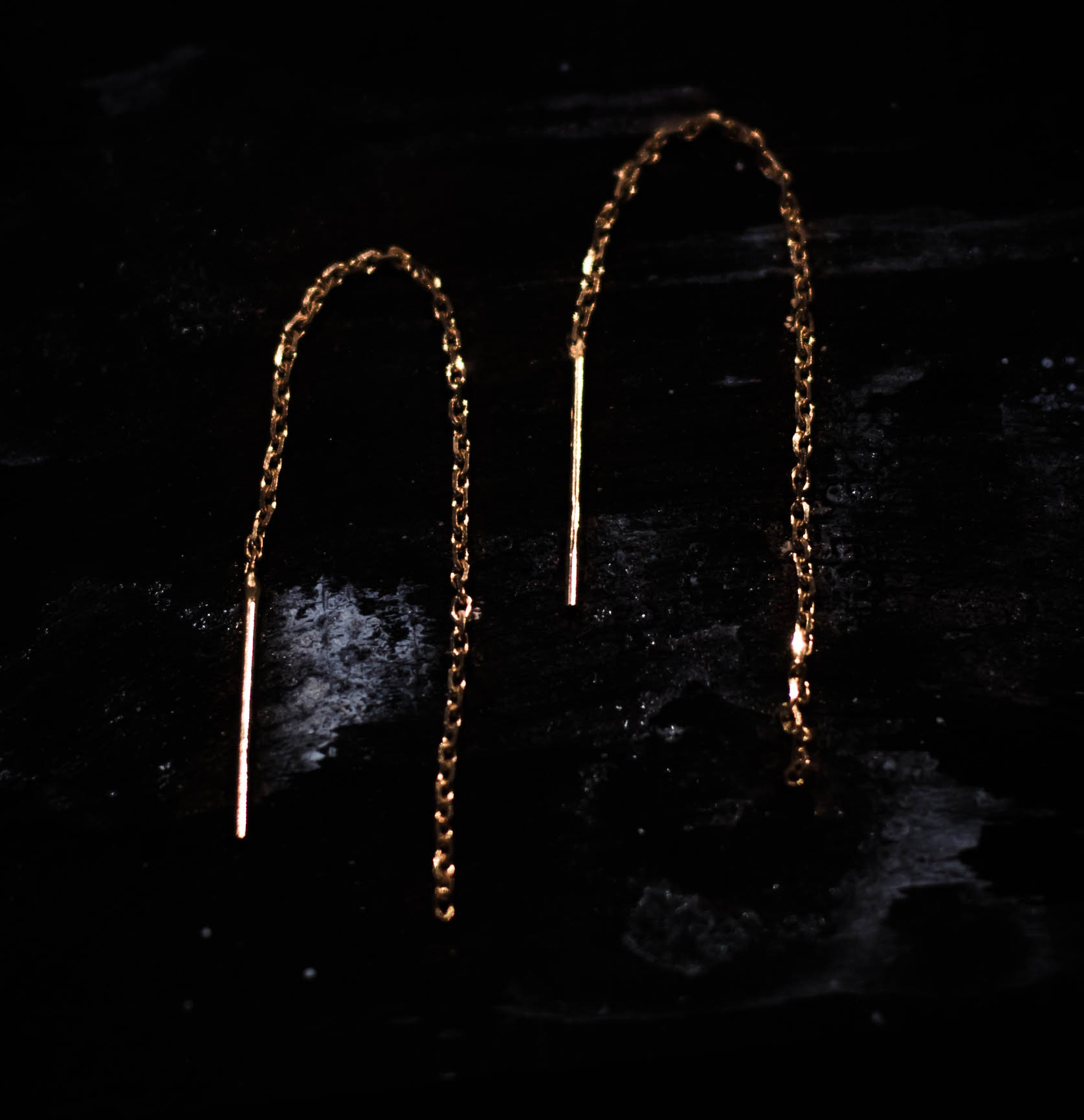 ''Solvind'' Chain earrings in 18k red gold