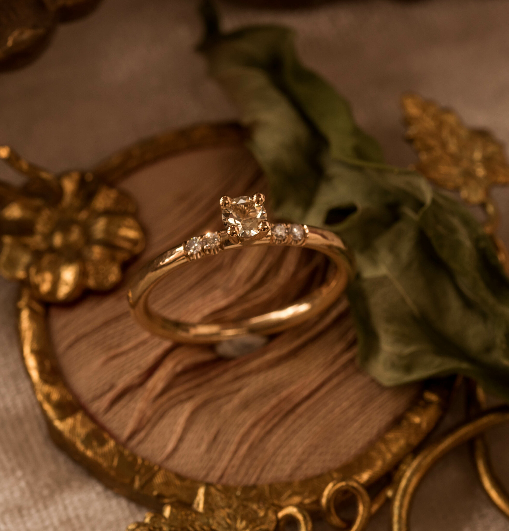''Myrguld'' 18k Gold Ring White Sapphire & Diamonds