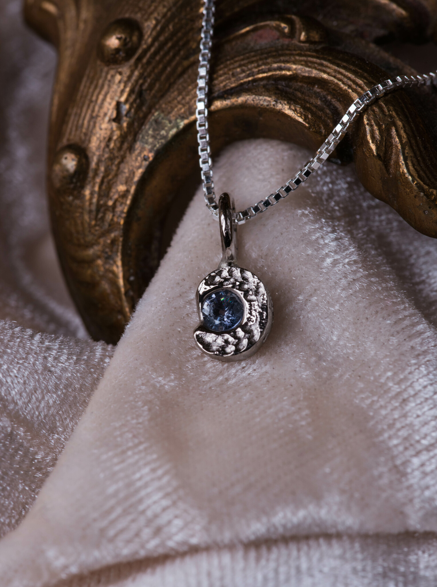 White gold ''Moon'' With Blue Sapphire