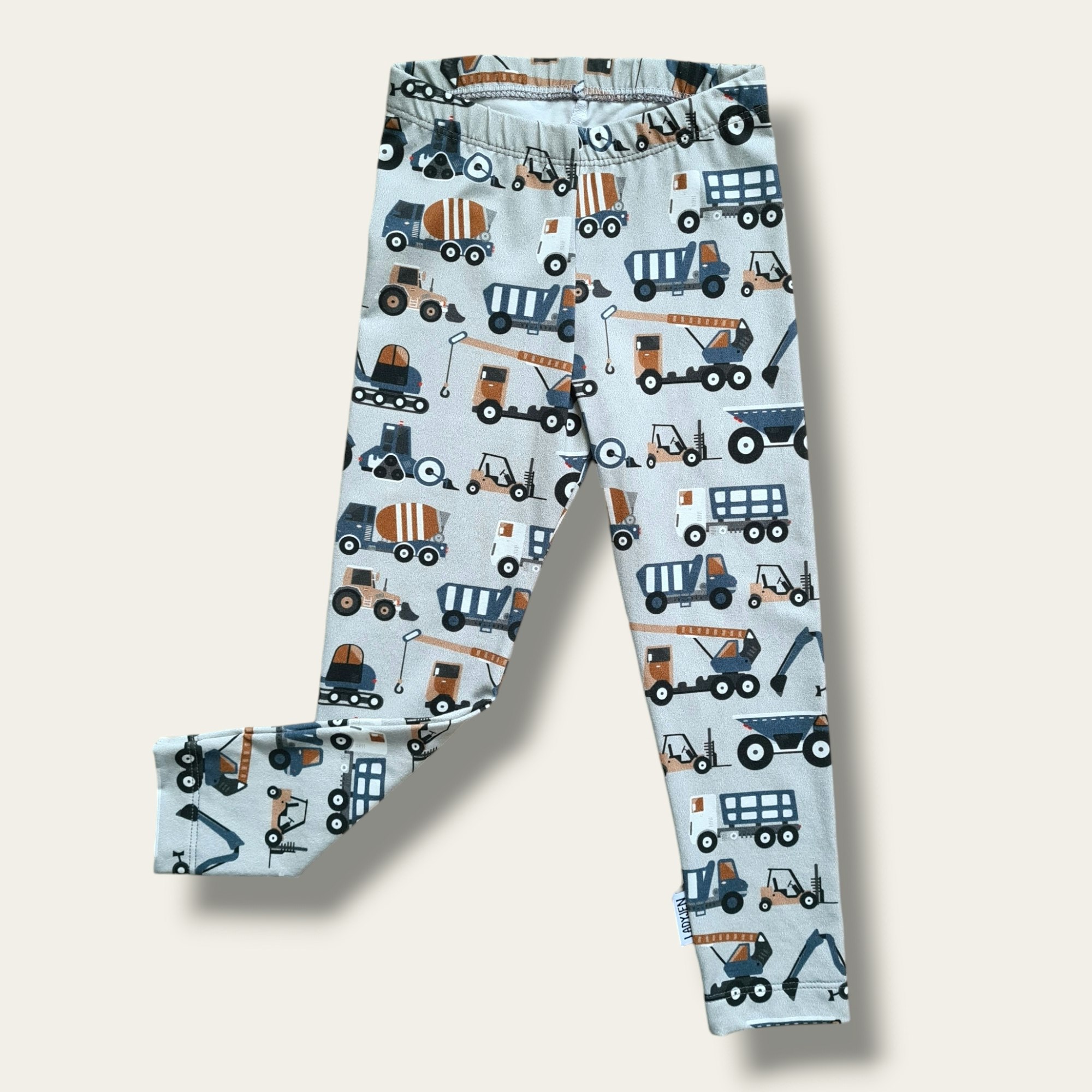 Ljusgrå leggings med fordon