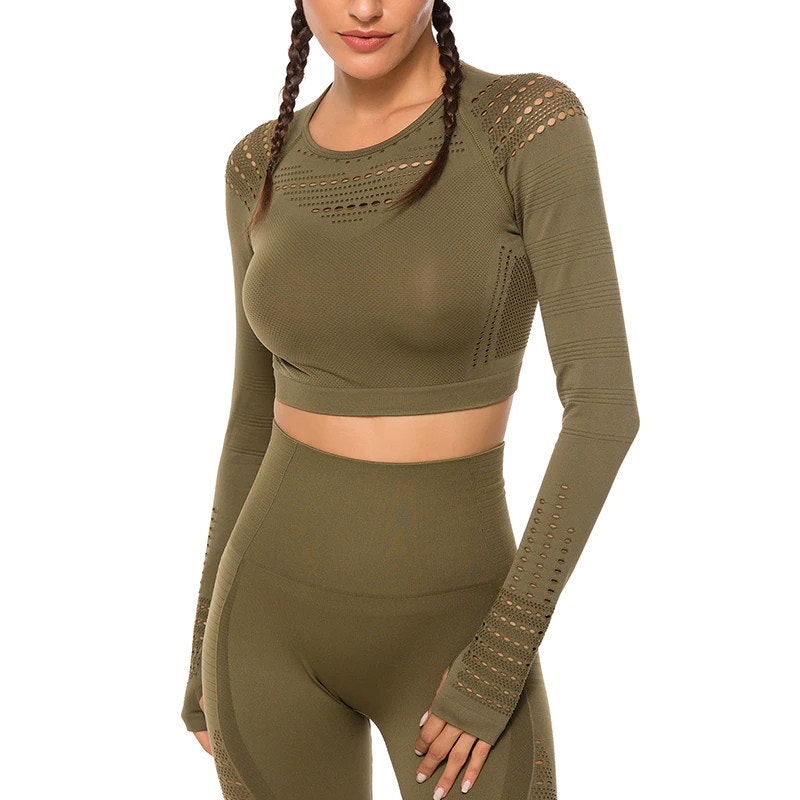 Grön Crop Top Träningstopp seamless med långa armar.