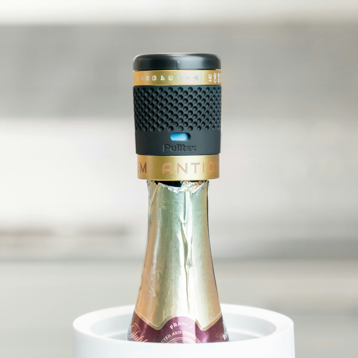 Champagne stopper guld