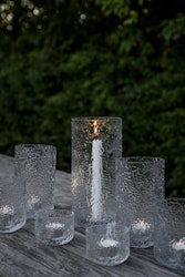 Ljuslykta mönstrat glas